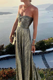 FJØRNA Celeste women's strapless A-line evening gown with pleated metallic fabric, elegant and flowing design.