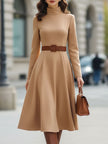 FJØRNA elegant camel turtleneck belted midi dress displayed on a model, showcasing the sleek design and stylish fit.