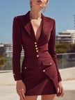 FJØRNA burgundy tailored blazer-style mini dress with gold-tone buttons, featuring a fitted silhouette and stylish design.