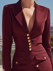 FJØRNA Burgundy tailored blazer-style mini dress with gold-tone buttons, fitted design, and long sleeves for a chic look.