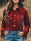 Red suede western tassel long sleeve shirt by FJØRNA, featuring fringe tassels and a fitted long sleeve design.