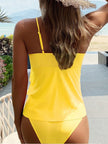 Women's summer V-neck swimsuit with ruffles by FJØRNA, featuring a stylish design and comfortable fit.