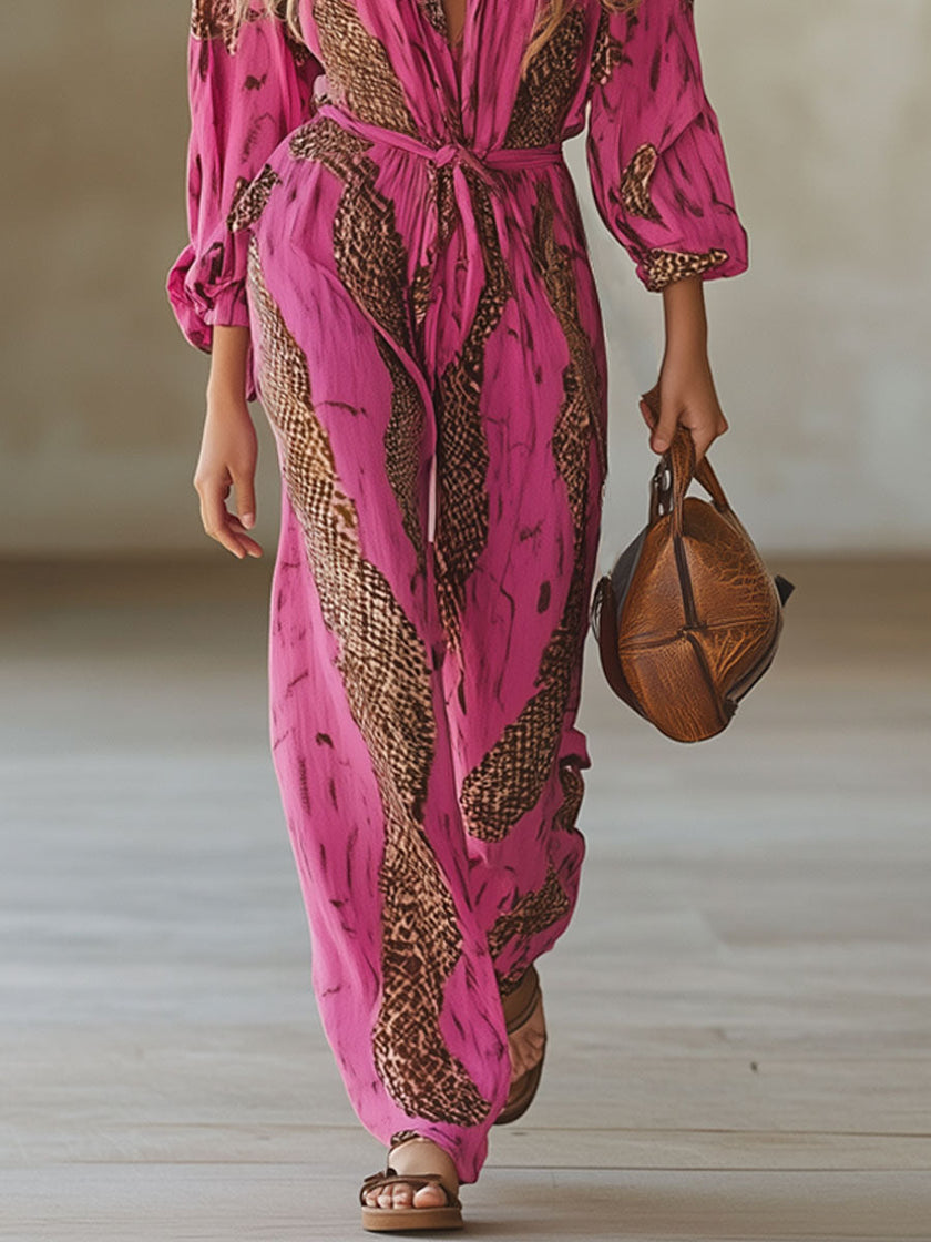 FJØRNA rose red leopard print chiffon long sleeve jumpsuit with a flowing silhouette and stylish design.