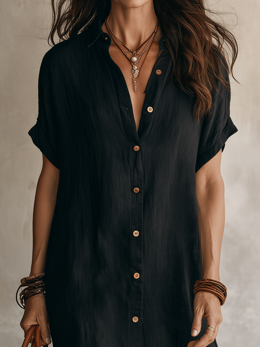 FJØRNA Modern Boho Black Linen Midi Dress, relaxed fit with effortless style, showcasing a versatile and comfortable dress design.