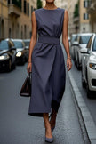 FJØRNA solid color sleeveless round neck casual midi dress displayed on a hanger, showcasing its simple, elegant design.