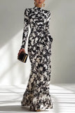 FJØRNA black and white color-blocked printed long-sleeved maxi dress with pockets, slim fit, pleated design, and stylish aesthetic.