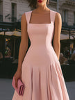 White FJØRNA structured square neck sleeveless midi dress displayed on a mannequin with a fitted waist and clean, elegant design.