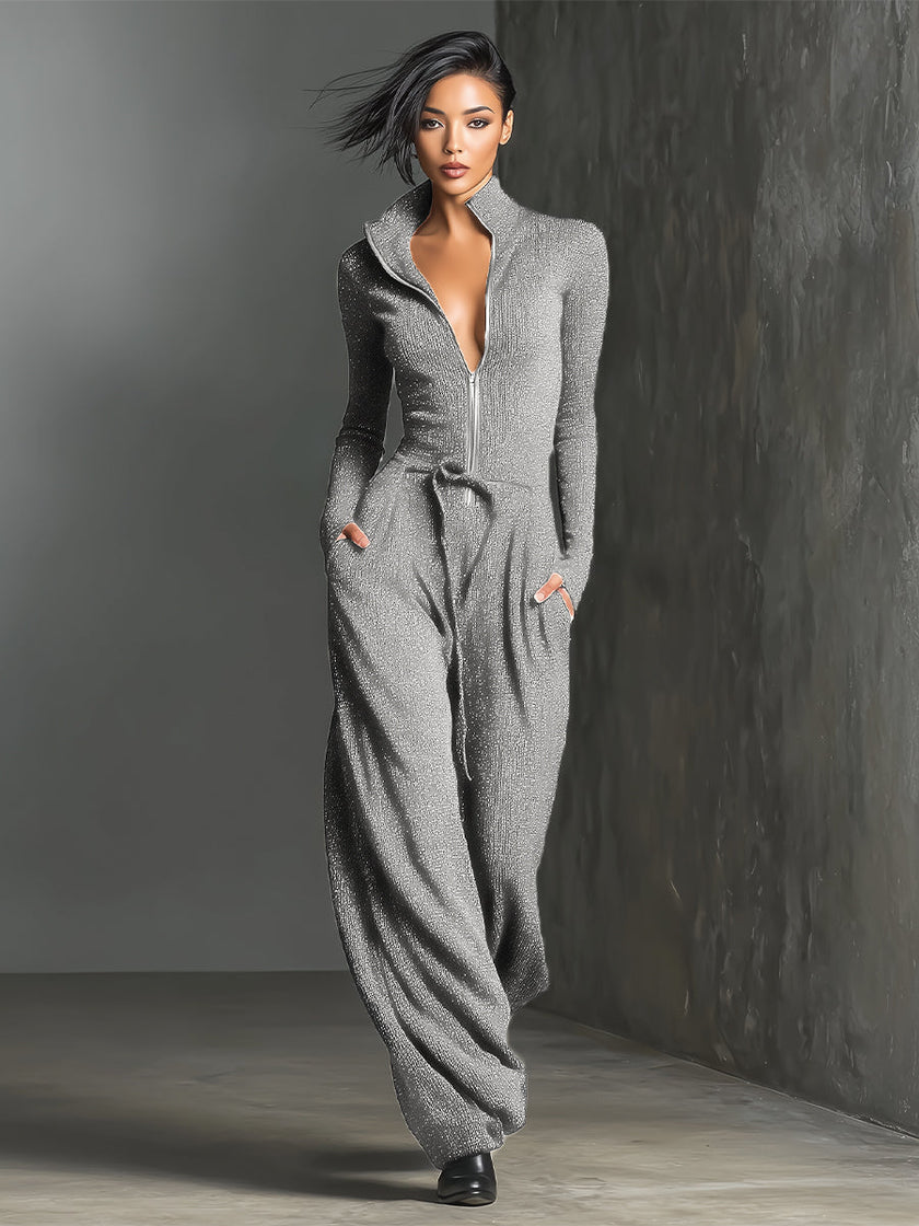 FJØRNA sparkling knit women's jumpsuit with zip front, long sleeves, and wide-leg pants, perfect for stylish casual wear.