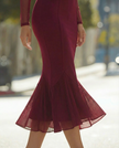 FJØRNA sheer high-neck mermaid midi dress for women, form-fitting dress with elegant, see-through fabric and high neckline.