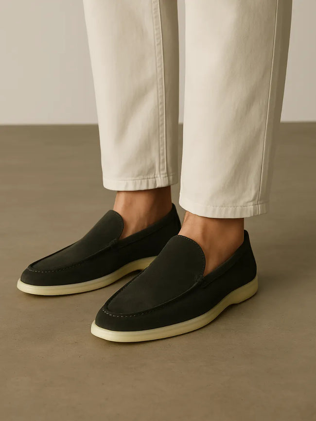 Men's dark green suede FJØRNA moccasin slippers with a soft, textured sole and classic slip-on design.