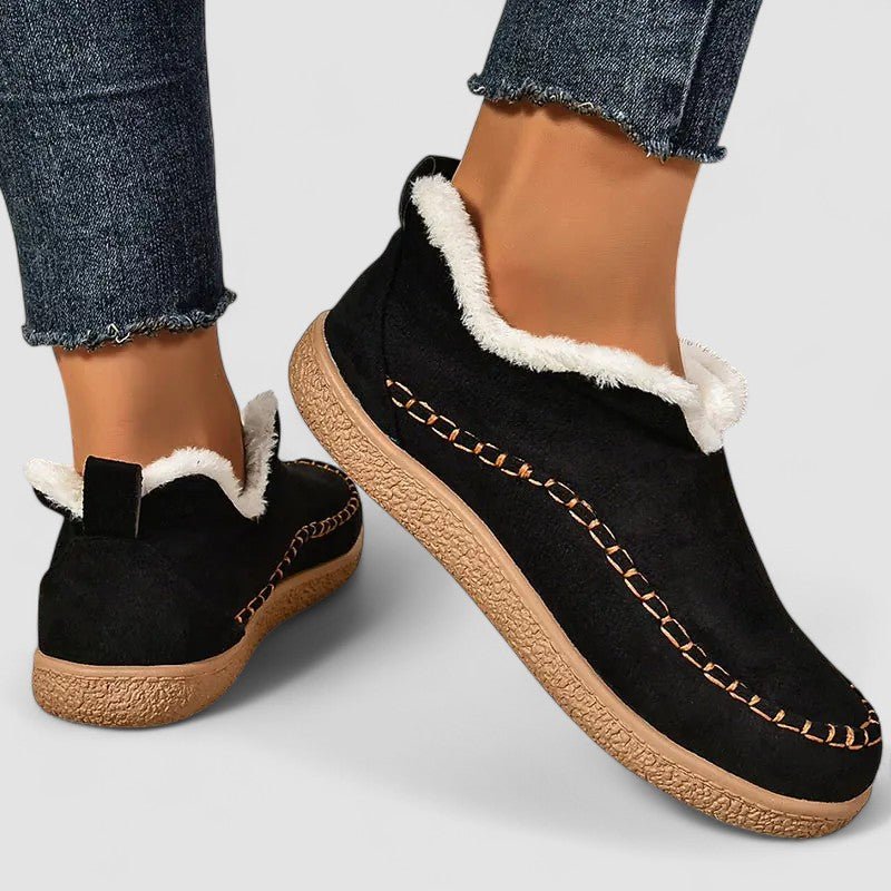 FJØRNA DORRY orthopedic boots in black with sturdy sole and adjustable straps, designed for foot support and comfort.