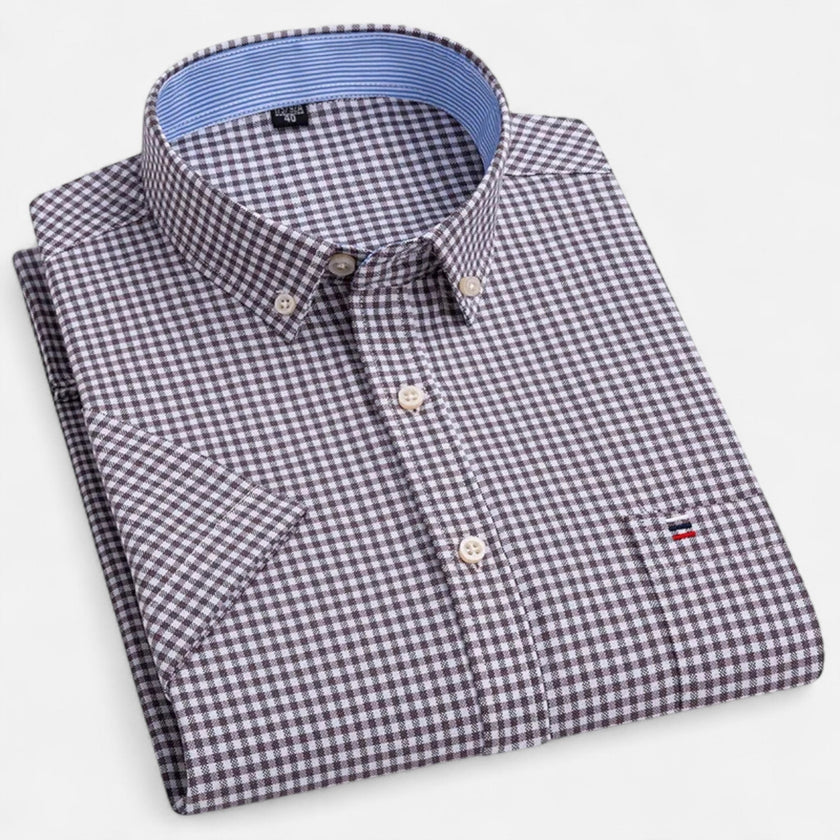 Men's FJØRNA Oxford cotton short sleeve button-up shirt, lightweight and casual for warm weather, with a classic collar and button front.