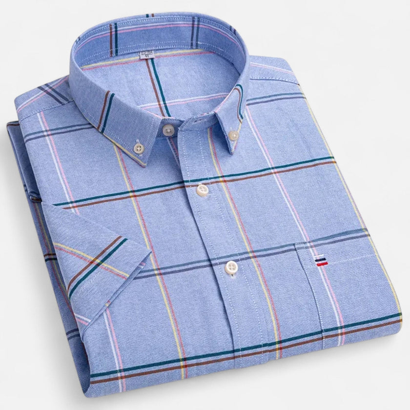 Men's FJØRNA Oxford cotton short sleeve button-up shirt displayed on a hanger, showcasing a classic men's shirt design and fabric detail.