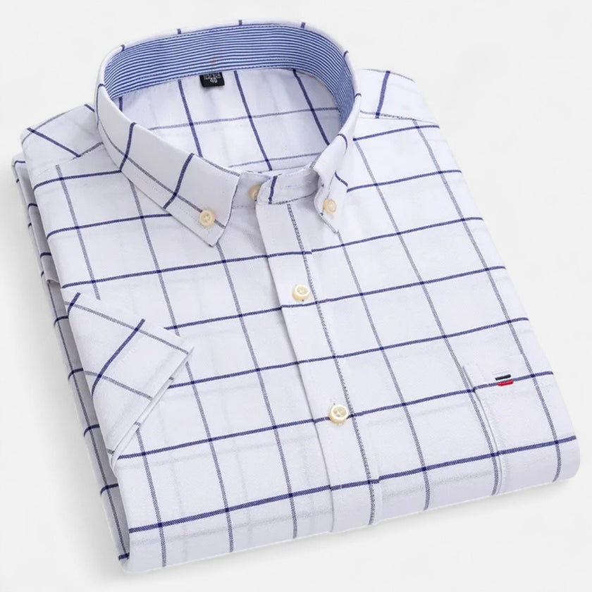 Men's FJØRNA Oxford cotton short sleeve button-up shirt with a classic collar and button front, displayed on a hanger.
