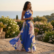 FJØRNA women's maxi dress with asymmetric neckline, casual summer style, suitable for casual and wedding occasions.