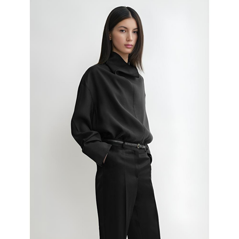FJØRNA women's linen top with short sleeves and relaxed fit, displayed on a plain background.