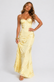 Women's floral jacquard corset maxi dress by FJØRNA with intricate lace details and a flowing silhouette.