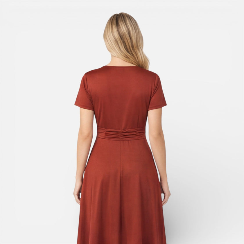 FJØRNA women's V neck wrap dress with high waist, suitable for formal events and wedding guests, in a stylish summer design.