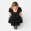 Women's V neck wrap dress by FJØRNA featuring a high waist design, perfect for formal occasions and wedding guest attire.