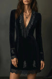 FJØRNA velvet V-neck long-sleeved mini dress with lace trim, stylish fashion dress for elegant occasions.