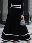 FJØRNA black and white contrast square neck midi dress with a vintage-inspired design and elegant midi length.