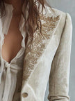 Ivory embroidered velvet blazer with long sleeves and lace cuffs, stylish FJØRNA long sleeve blazer for elegant occasions.