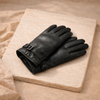 FJØRNA men's sheepskin leather gloves showing soft leather texture and snug fit, designed as stylish accessories for men.