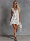 White lace V-neck mini dress from FJØRNA, casual style with delicate lace details and a V-neckline.