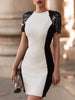 FJØRNA sculpted contrast panel short sleeve evening dress with elegant design, showcasing sleek fabric and stylish silhouette.