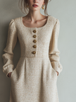 FJØRNA vintage tweed button long sleeve midi dress showcasing classic design and textured fabric in a stylish, elegant silhouette.