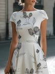 FJØRNA floral sketch print cap sleeve midi dress showing a fitted bodice, floral pattern, and flowing skirt.