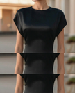 Elegant black satin waist-tie column midi dress for women by FJØRNA, featuring a sleek silhouette and sophisticated design.