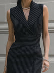 FJØRNA sleeveless pinstripe midi dress with tailored lapel collar, stylish and elegant for women's fashion.