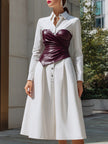White FJØRNA shirt dress with wine-red sculpted leather corset, structured two-piece set, stylish and fitted for a chic look.