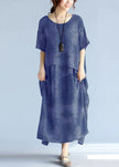 Gray linen cotton maxi dress by FJØRNA featuring a casual, flowing design perfect for wedding or everyday wear.