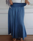 FJØRNA women's lightweight summer trousers with relaxed fit, elastic waist, and breathable fabric for comfortable warm-weather wear.
