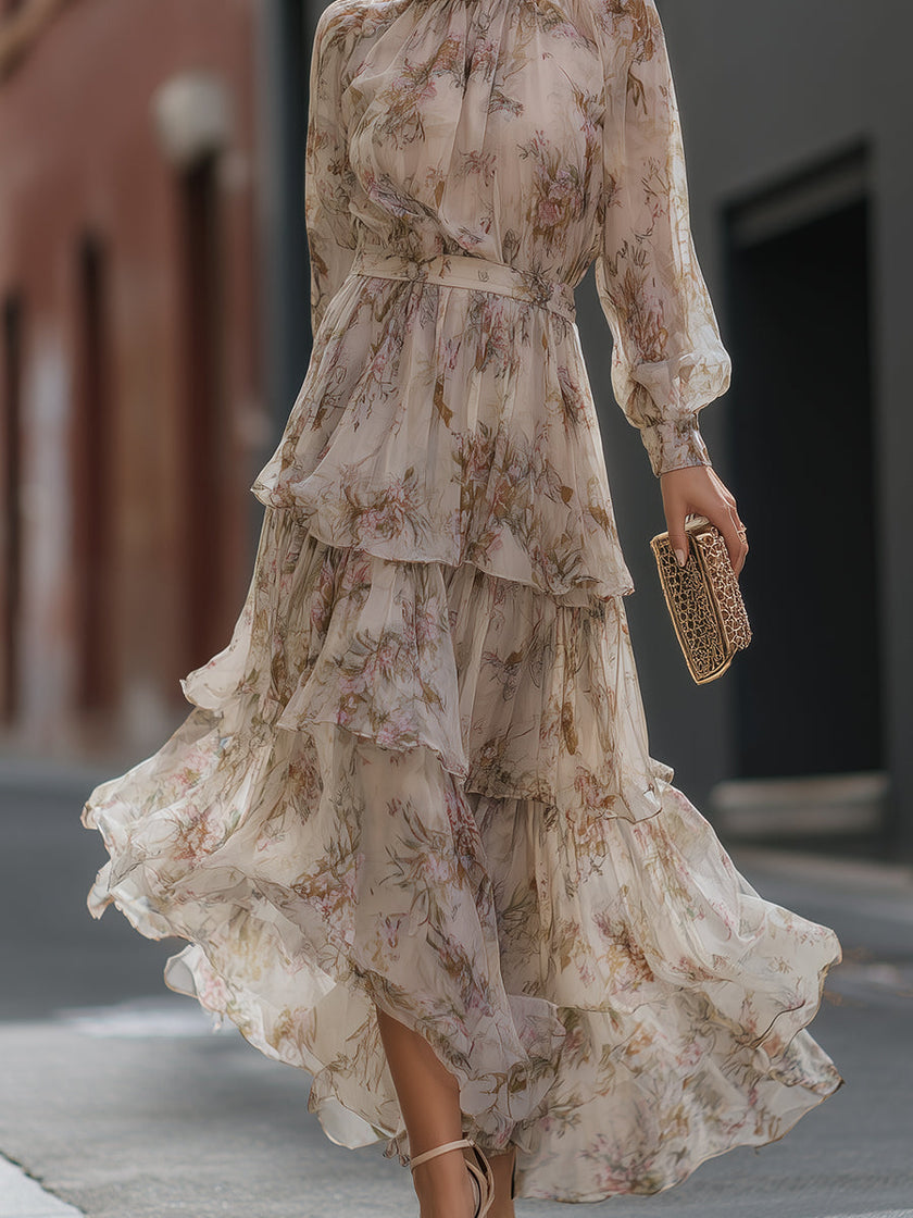 FJØRNA high neck tiered floral maxi dress with ruffled layers and vibrant flower pattern, perfect for summer occasions.