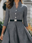 FJØRNA collared button-front fit-and-flare midi dress with belt, shown on a woman, featuring a feminine silhouette and stylish details.