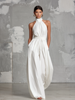 FJØRNA woven halter-neck sleeveless jumpsuit with wide-leg pants, elegant and stylish for women, shown in the product image.
