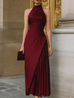 FJØRNA burgundy halter-neck asymmetric pleated midi dress with flowing fabric and elegant silhouette, perfect for formal occasions.
