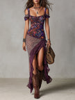FJØRNA women's leopard print maxi dress featuring a flowing silhouette and bold animal pattern.