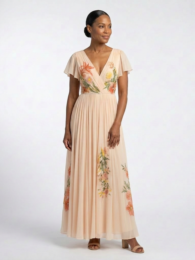 FJØRNA women's summer maxi dress with floral print, short sleeves, and pleated design, perfect for warm weather and casual wear.