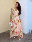 FJØRNA elegant floral maxi dress for women with short sleeves, flowing fabric, perfect for summer or special occasions.