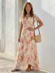 FJØRNA women's floral maxi dress with short sleeves, flowy fabric, and elegant design for women’s summer or formal wear.