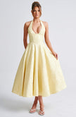 FJØRNA Bruna wedding guest halter midi dress in navy, elegant knee-length dress perfect for special occasions and weddings.