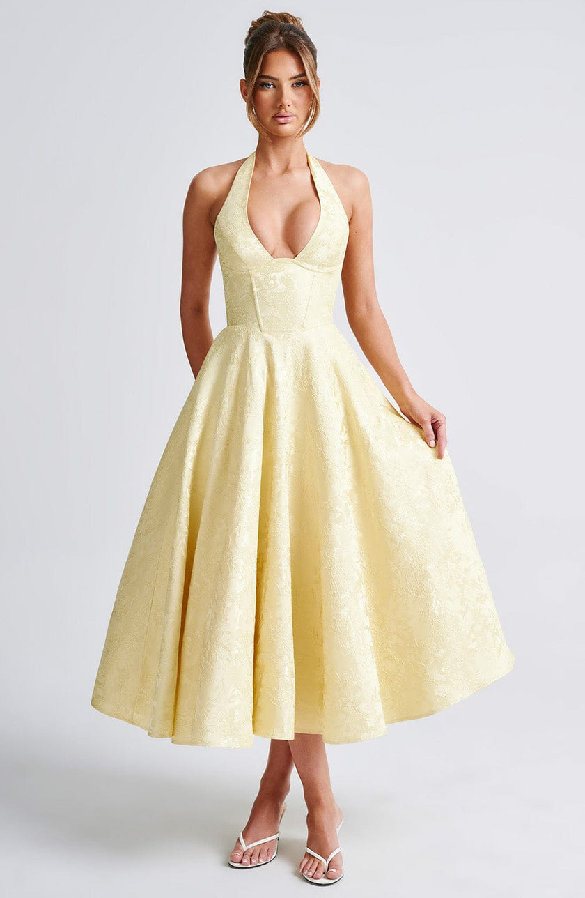 FJØRNA Bruna wedding guest halter midi dress in navy, elegant knee-length dress perfect for special occasions and weddings.