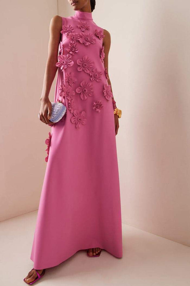 FJØRNA Adeline Blossom Elegance Maxi Dress in white with floral embellishments, sleeveless design, perfect for formal occasions.