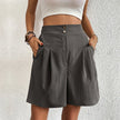 FJØRNA women's lightweight summer shorts with high waist, wide leg, and pleated design, shown in a relaxed fit style.