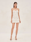 FJØRNA Blanc mini dress with delicate rosette detailing and lightweight georgette fabric, stylish and feminine for special occasions.