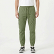 Men's slim fit cotton cargo trousers by FJØRNA, showing the tailored fit and multiple cargo pockets on the front.